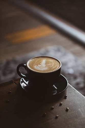 cup black ceramic teacup with coffee beverage